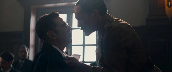 Two men have a tense confrontation in Kesari Chapter 2: The Untold Story of Jallianwala Bagh.